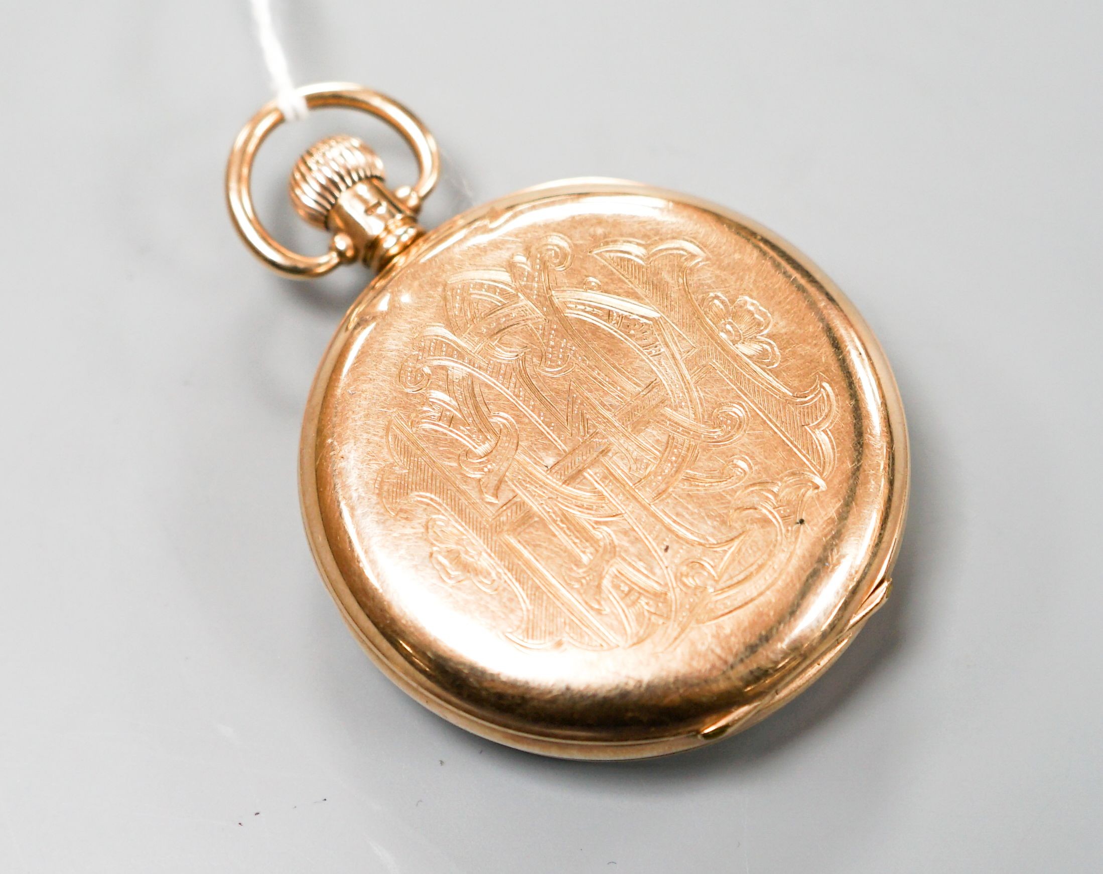 A 9ct gold open face Waltham keyless pocket watch, with engraved monogram, case diameter 50mm, gross weight 83.2 grams.